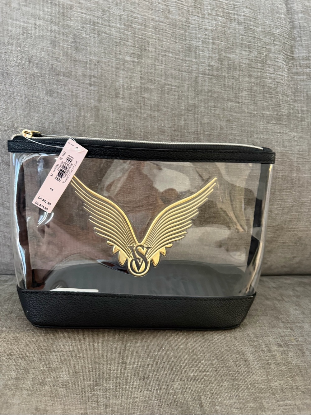 Victoria’s Secret Clear Black & Gold Winged Zip cosmetic bag